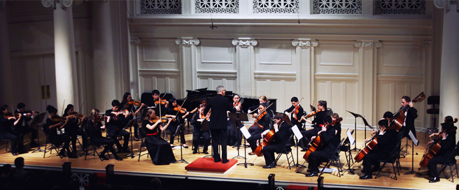 Academy Chamber Orchestra performing on stage.